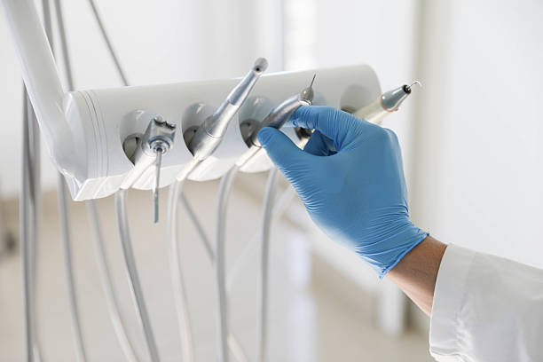 Professional Tooth Extraction technician working in Mansfield Center, MA